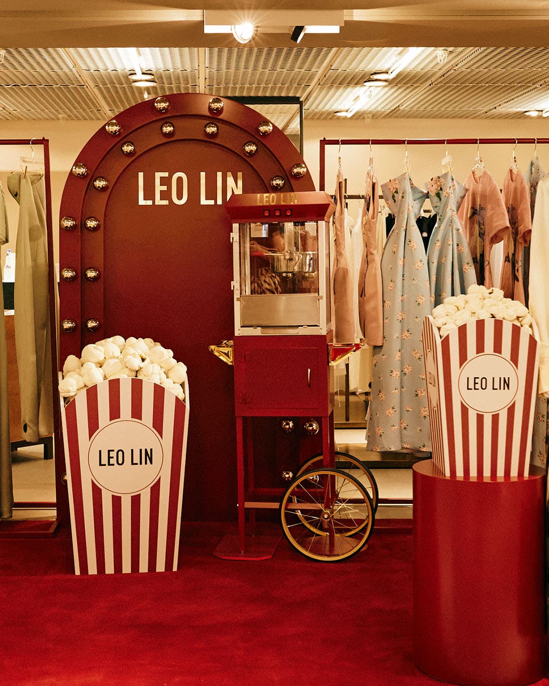 Deep red theatre curtains drawn back in a vintage cinema